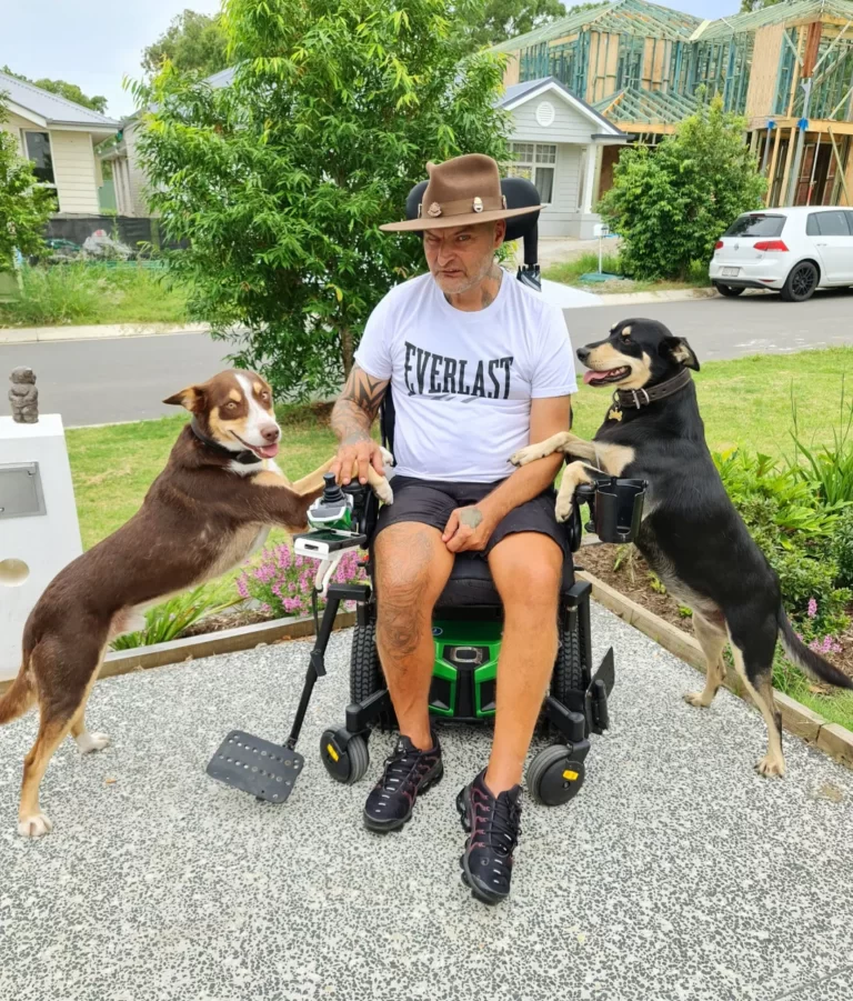 NDIS Support Coordination participant Jake and his two dogs
